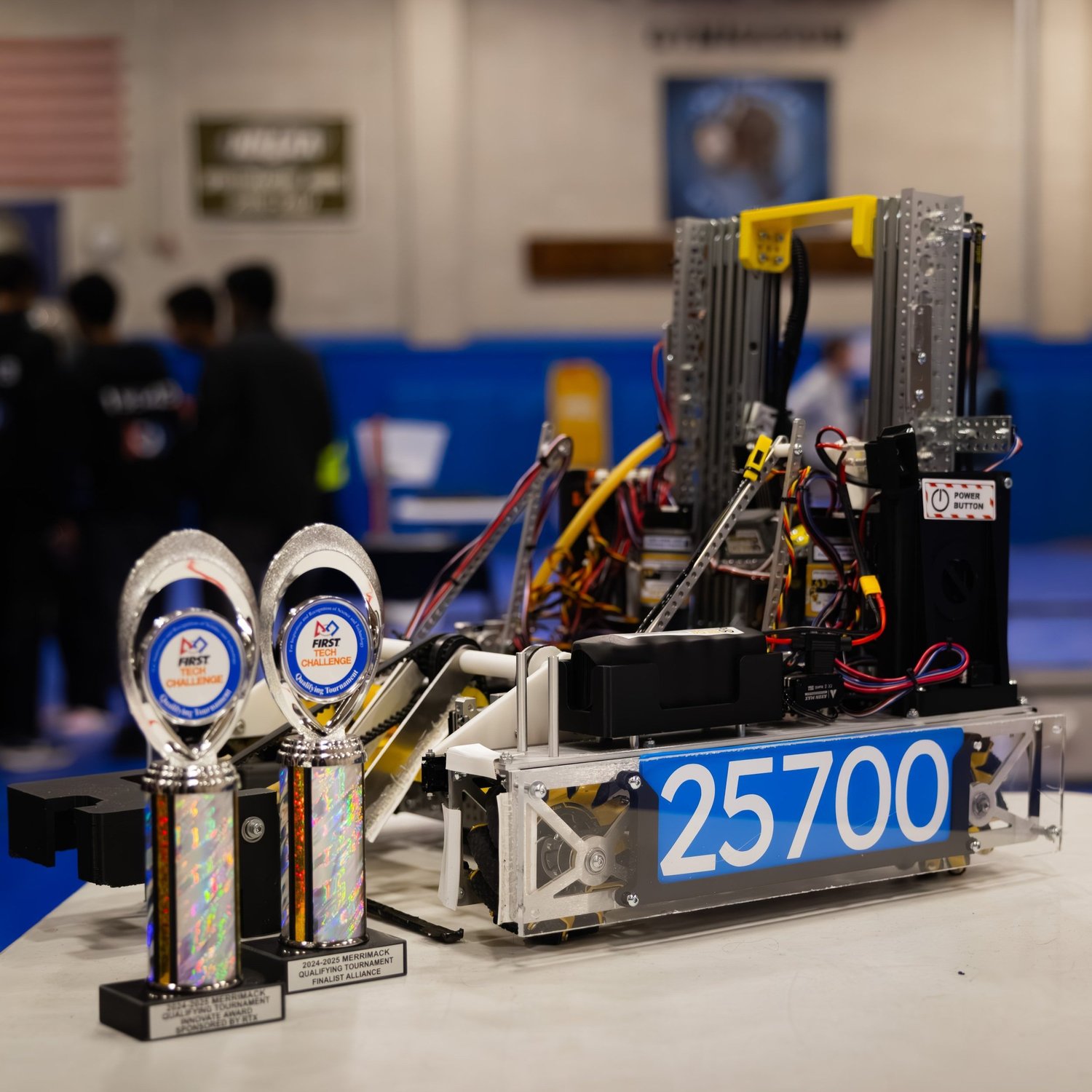 Into the Deep robot with two Merrimack trophies