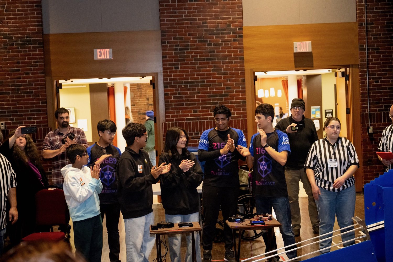 Crowd applauding at the event